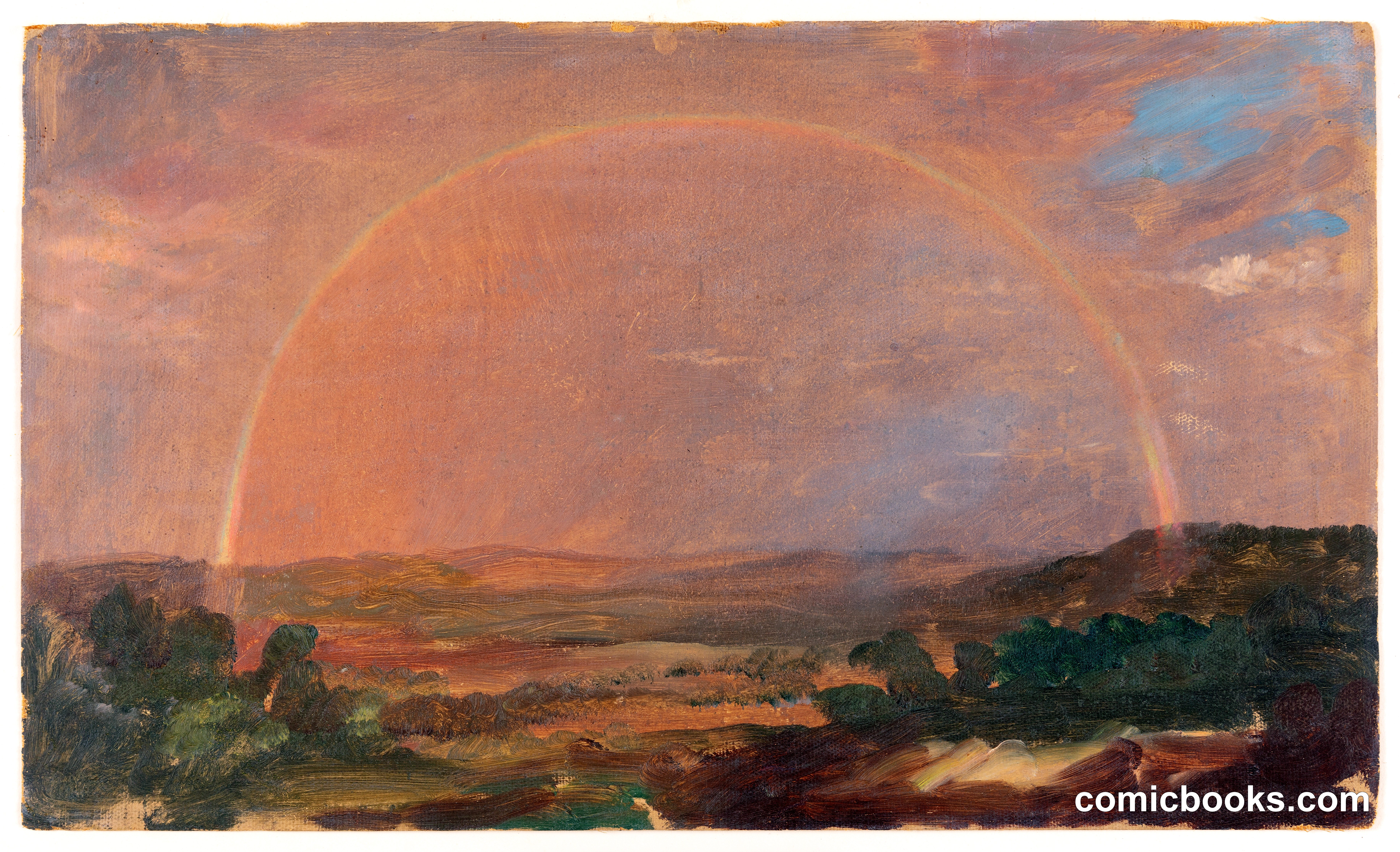 Rainbow over a Hilly Landscape
